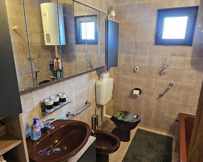 Stan u kući i dvije garsonijere