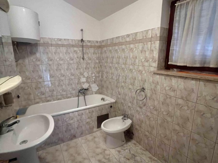 Kuća u okolici Marčane, dvojna kuća 113m2