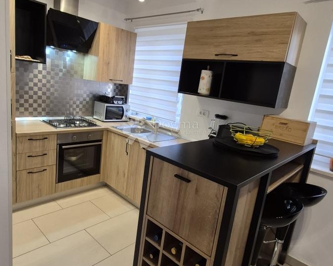 Dvoetažni stan površine 91,05 m2 u Balama