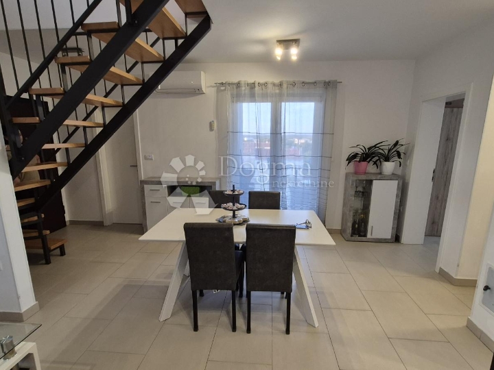 Dvoetažni stan površine 91,05 m2 u Balama