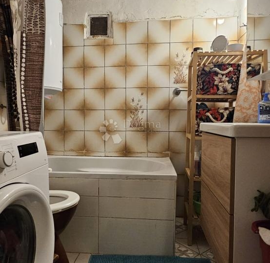 Kuća u srcu grada s impresivnom krovnom terasom