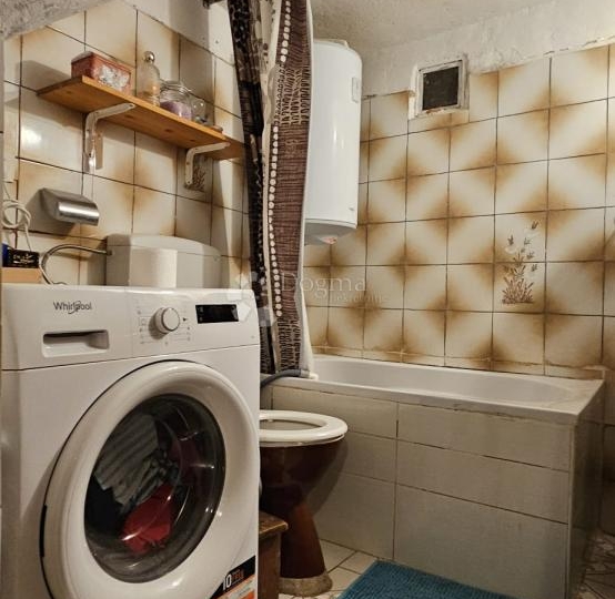 Kuća u srcu grada s impresivnom krovnom terasom