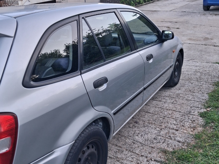 Mazda 323f, reg. god. dana, 1350 €