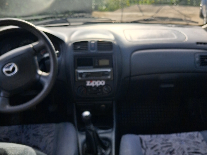 Mazda 323f, 1.5, 2001. god., reg. 08/2027.